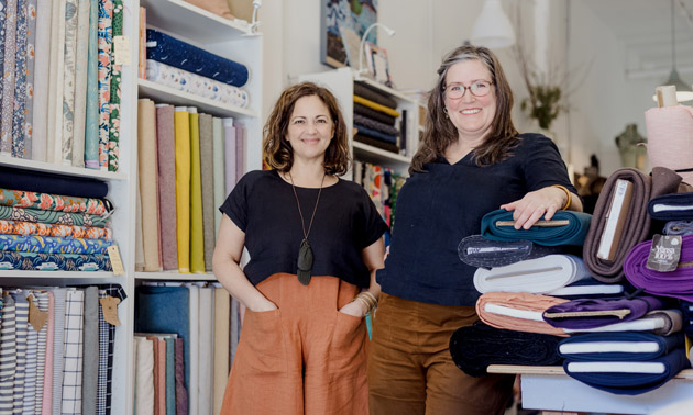 Deborah Achleitner (L) and Sarah Albertson (R), co-owners of the Nelson Stitch Lab, standing in store. 