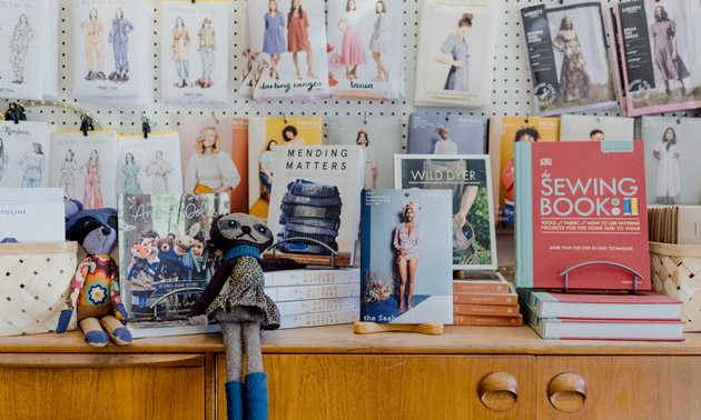 Display of patterns and sewing books. 