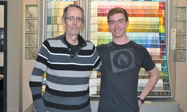Tom Oglow, owner of Oglow’s Paint, Wallcoverings and Window Blinds in Castlegar, and student Patrick Linkletter.