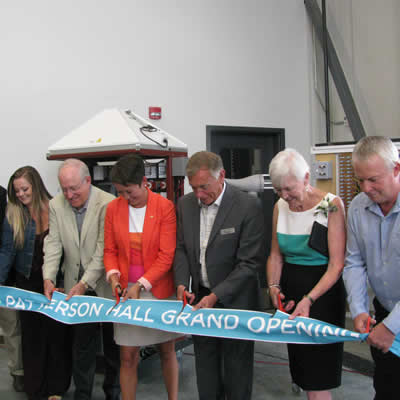 Cutting the ribbon at the grand opening of Patterson Hall were Jesse Nichols (COTR board of governors), Sarah Weech (COTR trades student), Rick Jensen (CBT), Melanie Mark (province of B.C.), David Hall (COTR), Nancy Eckstein (nee Patterson) and Larry Davey (Teck).