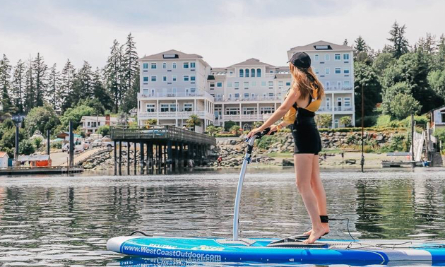 Danelle paddling by Sooke Oceanfront Resort