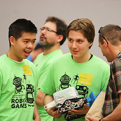 Brian Malito (centre) is a Grade 12 student from J L Crowe Secondary School in Trail. He’s competed in four RoboGames including the first one held in Nelson in 2010. 