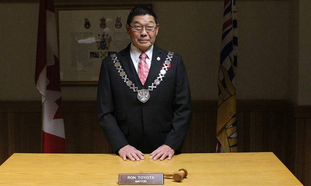 Ron Toyota, mayor of Creston, wearing his chain of office