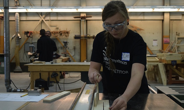 Post-secondary cabinetmaking winner Samantha Sheppard shows her skill.
