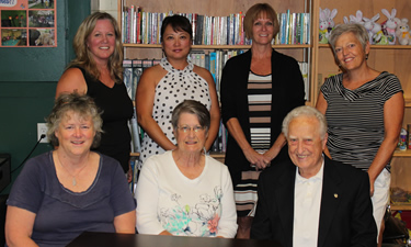 The volunteer board of the Generation to Generation Society in Trail, B.C.