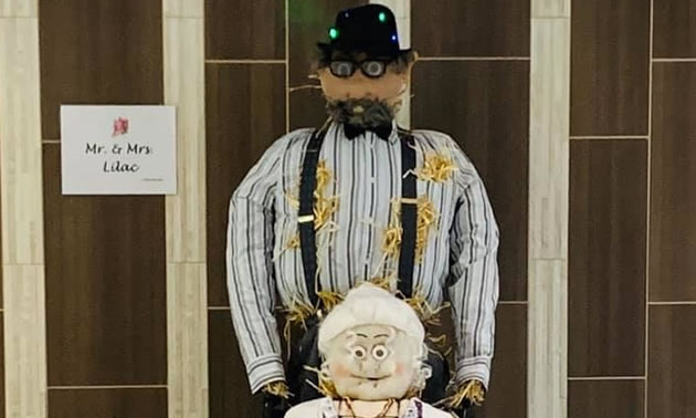 Two scarecrows, an old man standing and an old woman sitting. Staff at Lilac Terrace created the town’s winning scarecrows, which were displayed at the mall and voted on by viewers.