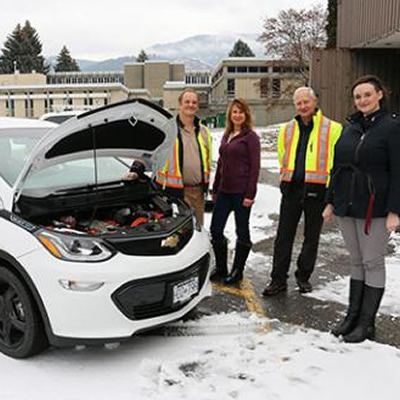 Members of the Selkirk College facilities team—(L-R) Mike Geisler, Melanie Perepolkin, Ron Zaitsoff and Pauline de Grandpre—check out the new Chevrolet Bolt which has been added to the college fleet.