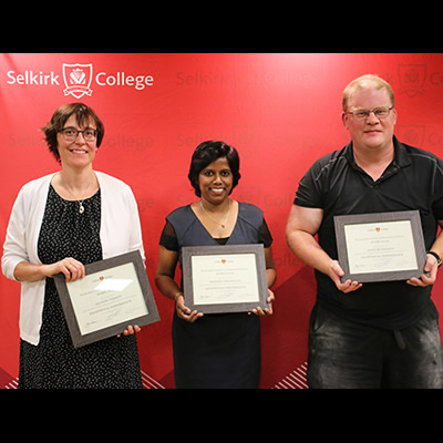 The Selkirk College Faculty Association Standing Committee on Professional Excellence (SCOPE) Awards recognized outstanding contributions to post-secondary education in the region at the annual event. From left to right are Allyson Perrott, Muditha Heenkenda and Doug Henderson.