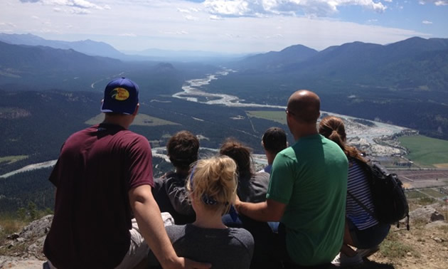 The Sterzer family enjoys a panoramic view of Canal Flats and the Columbia Valley from the top of Mount Sabine. 