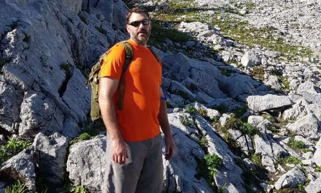 Steven Droste hiking near Sparwood, B.C.