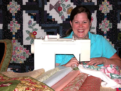 Tina Ihas  at her sewing machine