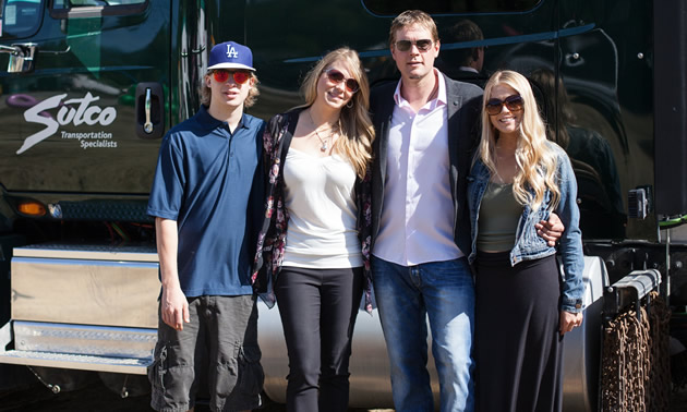 Cole, Melanie, Chris and Courtney Sutherland, with a Sutco truck