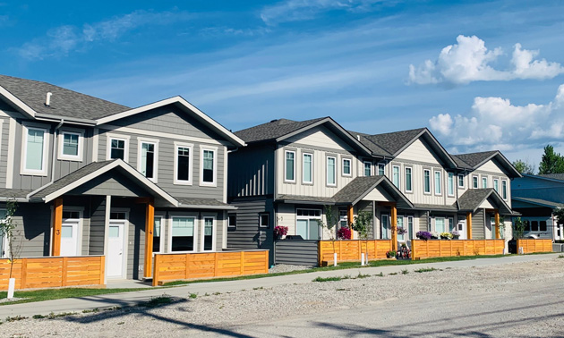 Outside of Parkside Place Project in Invermere, showing row of townhomes. 