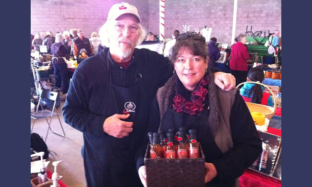 Gary and Susan Snow of Tabletree Juice showcasing their products at the recent Cranbrook Farmer’s Market.