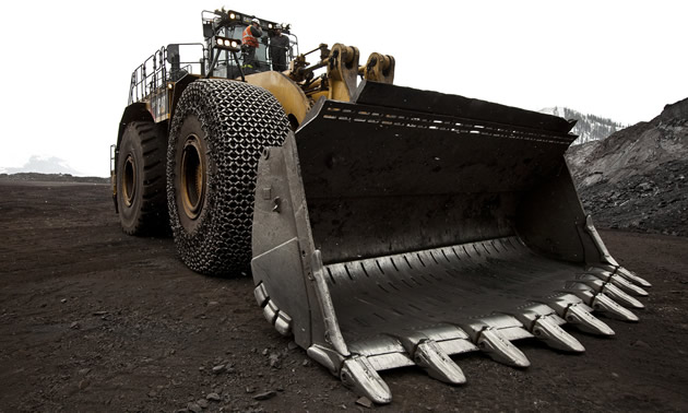 From the ground level, a bulldozer sits at Line Creek mine in the Elk Valley.