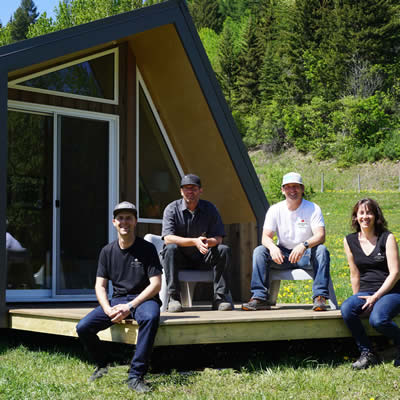 (L to R) Jude Smith, Ian Larsen, Steve Whelan and Rachel Cline enjoy the sunshine on the deck of a Little Cabin.