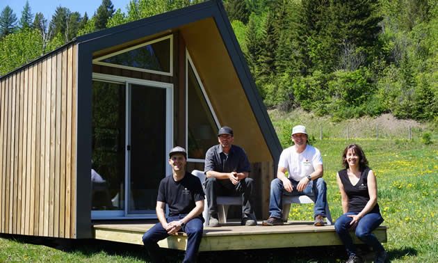 (L to R) Jude Smith, Ian Larsen, Steve Whelan and Rachel Cline enjoy the sunshine on the deck of a Little Cabin.