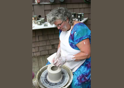 Ruth Prosser of Thunderhoof Clayworks demonstrates the art of pottery making.