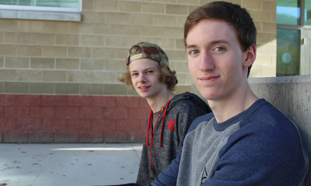 Tim Baldwin (L) and Jordan Strobel were the winners of the senior category of the 2014 Junior Dragons' Den competition in Trail, B.C. Their business is called Ebon Supply Co. 