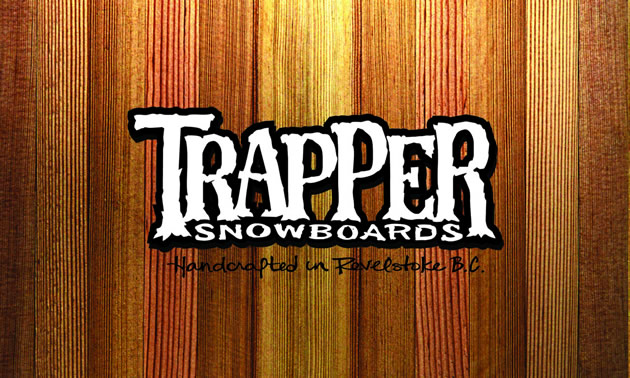 A white Trapper Snowboard logo also reads 