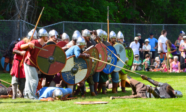 Viking reenact a battle