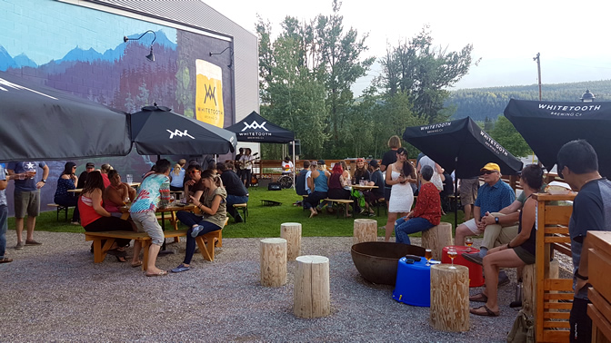 Whitetooth Brewing Co. patio in Golden, B.C., designed by LARCH Landscaping Architecture + Authentic Mountain Design.