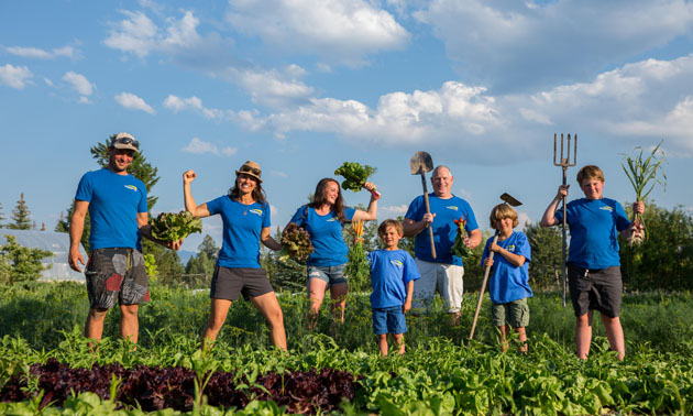 Lin and Oliver Egan together with Anna Steedman and Chef Randy MacSteven and sons in garden field making funny poses. 