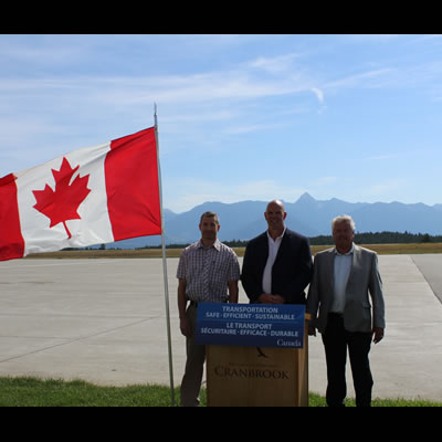 Picture of area dignitaries announcing funding for upgrades to the Canadian Rockies International Airport. 