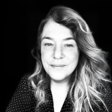 black and white headshot of Kim