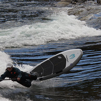 Andrea Ryman is SUP river surfing in Trail, B.C.