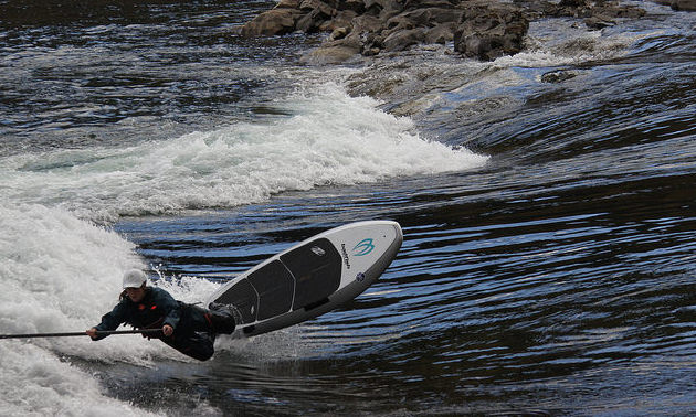 Andrea Ryman is SUP river surfing in Trail, B.C.