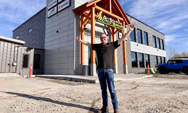 Dalton standing in front of the showroom
