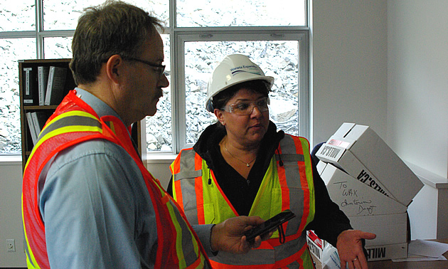 Audrey Repin talking to Keith Powell. 