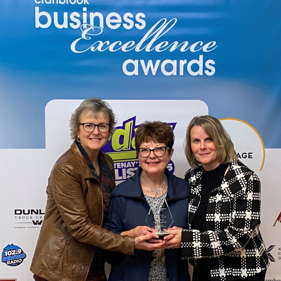 Owner of Life Balance with two other ladies accepting chamber of commerce awards