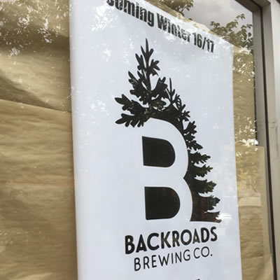 Sign for Backroads Brewing Company. 
