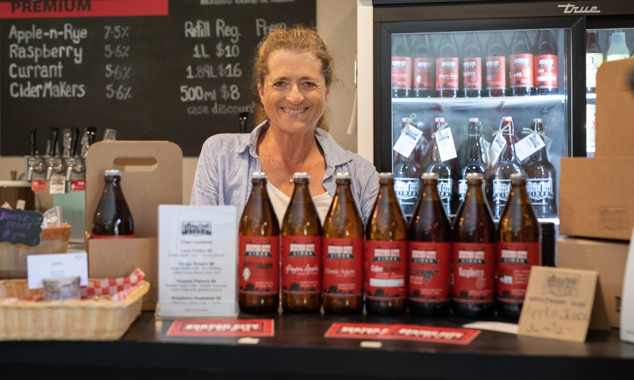 Barbara Ross at the bar in the Burton City Cider tasting room