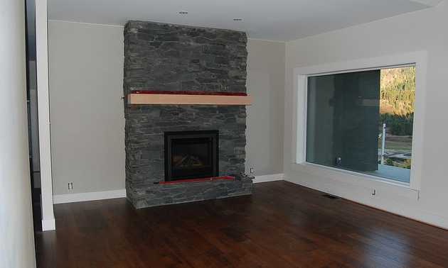 A fireplace in a basement.