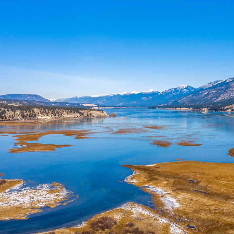 overview of blue waterways, blue sky and mountains