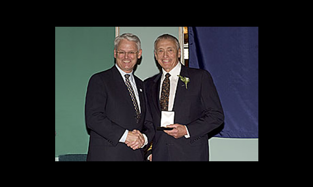 In this file photo, Geoff Battersby receives a BC Achievement award from then Premier Gordon Campbell.
