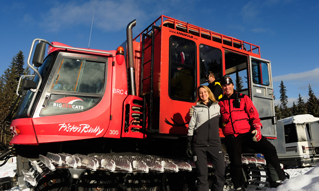 Owners standing next to a snowcat in Rossland, bC