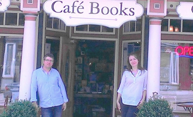 Evans Rora (owner) and his wife, Laura, standing in front of Cafe Books West in Castlegar. 