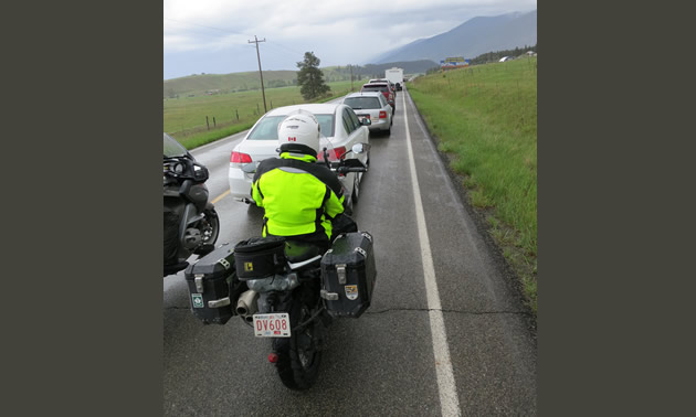 long line of vehicles waiting at the border