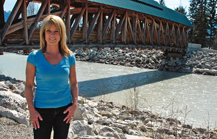 Christine Benty standing beside a bridge