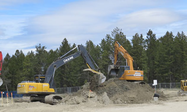 Heavy equipment breaking ground for the new Trade Building at the College of the Rockies. 