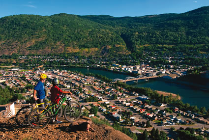 kids riding bikes in the mountains