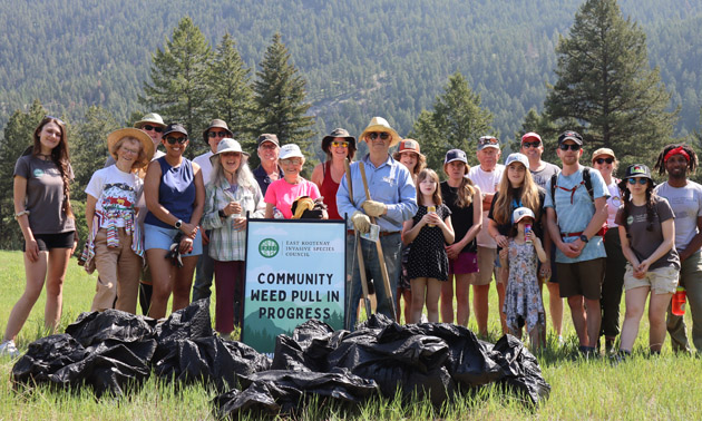 Group of people at a Community Weed Pull. 