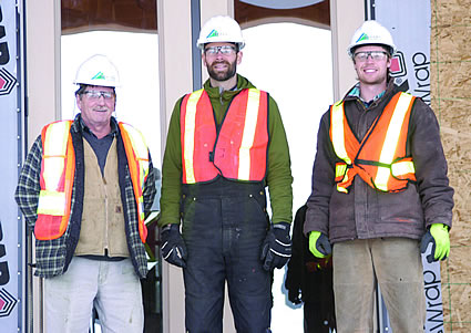 Photo of three construction men
