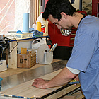 man working at a table