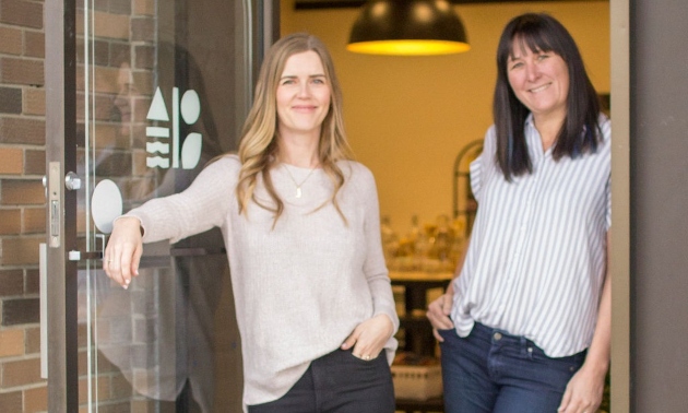 Aysha and Joanna standing in the doorway at Drift and Sonder in Fernie