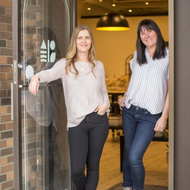 Aysha and Joanna standing in the doorway at Drift and Sonder in Fernie